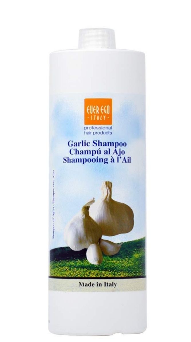 Garlic shampoo bottle with garlic illustration on a white background