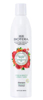 Biotera shampoo bottle with fruit graphics on a white background