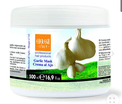 Garlic mask container with garlic bulbs on a white background