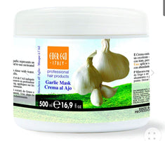 Garlic mask container with garlic bulbs on a white background