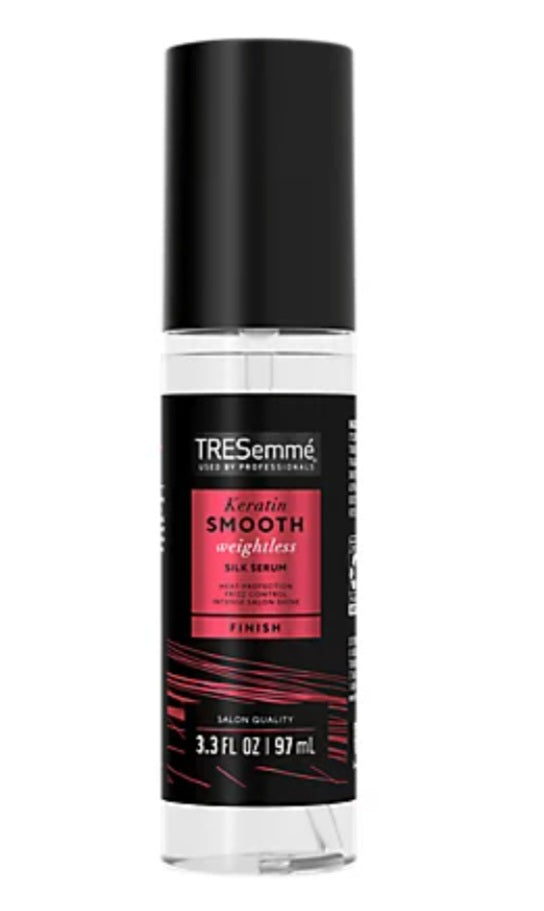 Tresemme serum bottle on a white background