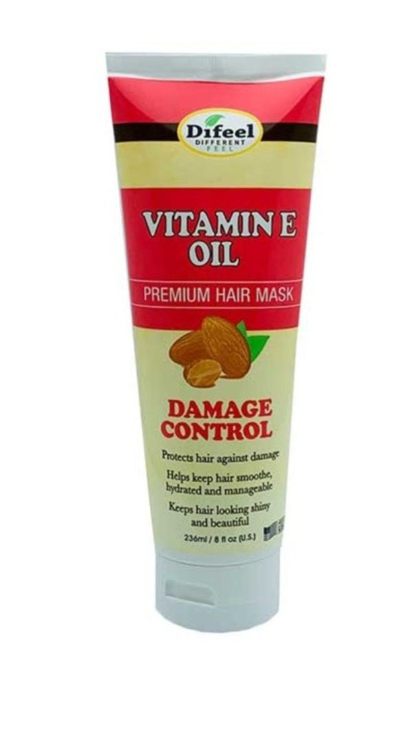 Tube of Difeel Vitamin E Oil Premium Hair Mask with red and green label on a white background